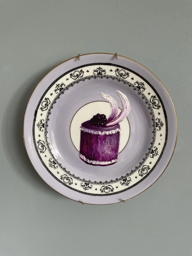 blackberry cake painting on plate