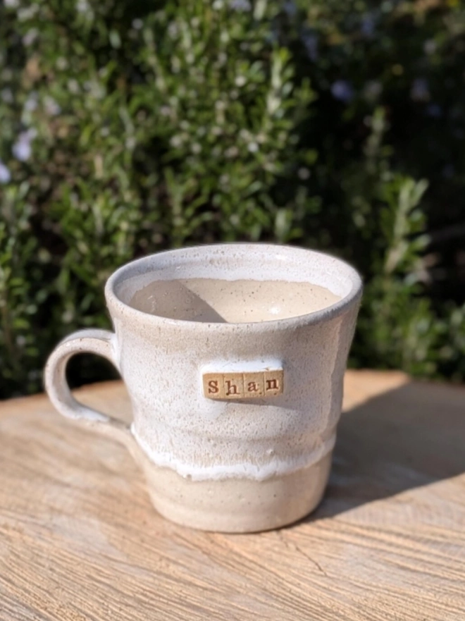 Personalised Ceramic Tea Mug. A mug in shoreline