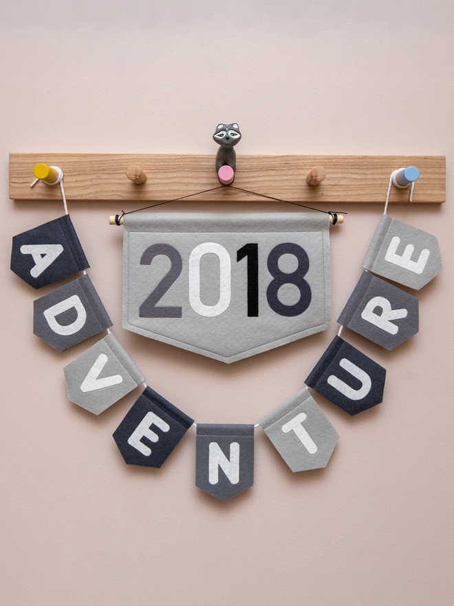 felt 2018 year banner in black and grey monochrome.