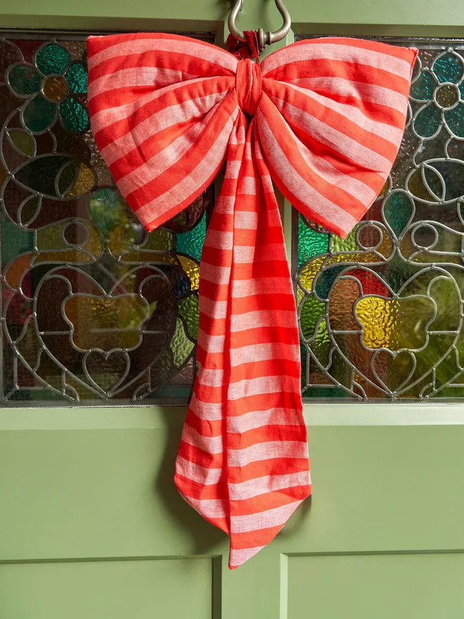 Red and pink stripe bow
