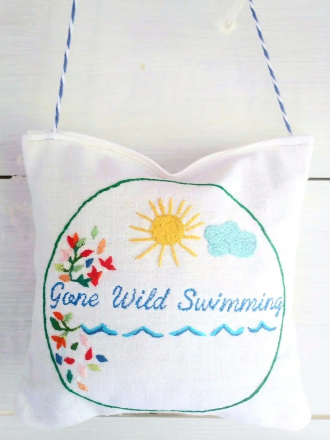 Wild Swimming Lavender Sachet. A sachet of lavender with hand embroidered wild swimming design.
