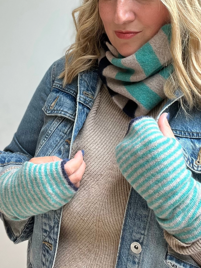 Jade mushroom navy stripe snood being worn with matching wristwarmers