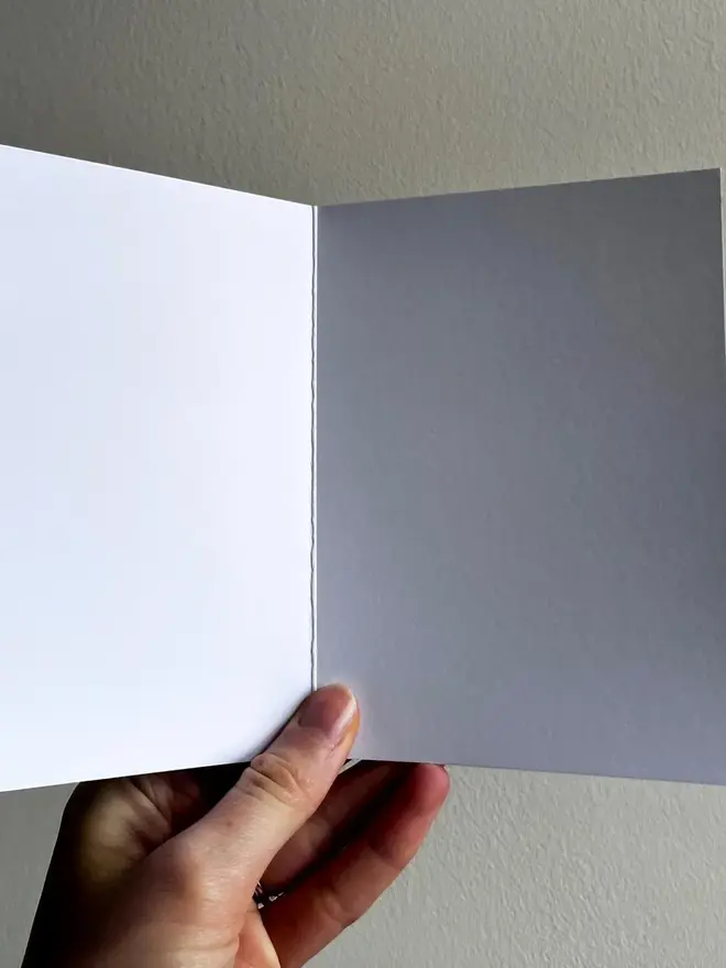 to my wonderful husband illustrated christmas card. christmas card open to show blank inside.