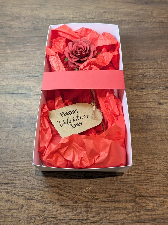 Single red rose in handmade gift box
