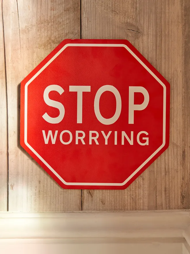 Stop worrying sign