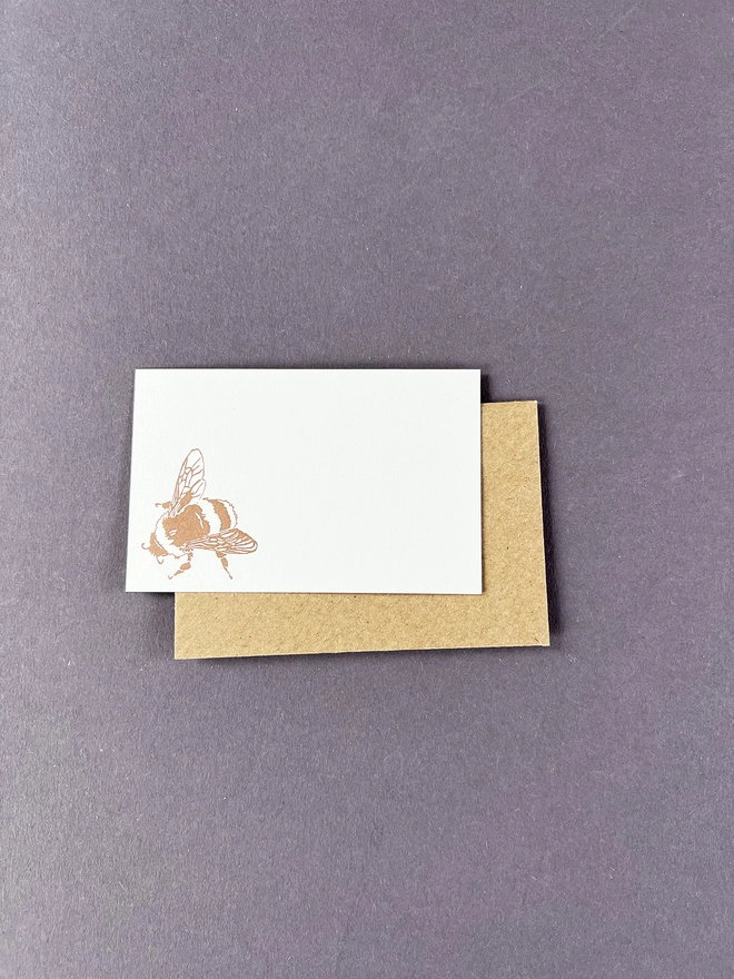letterpress tiny notes illustrated with a gold bumble bee and kraft brown envelopes