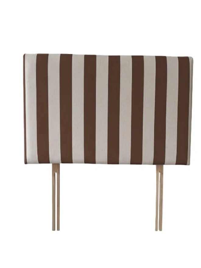 Hand Painted Upholstered Linen Headboard In Stripe Print, a mocha striped headboard sitting against a white background. 