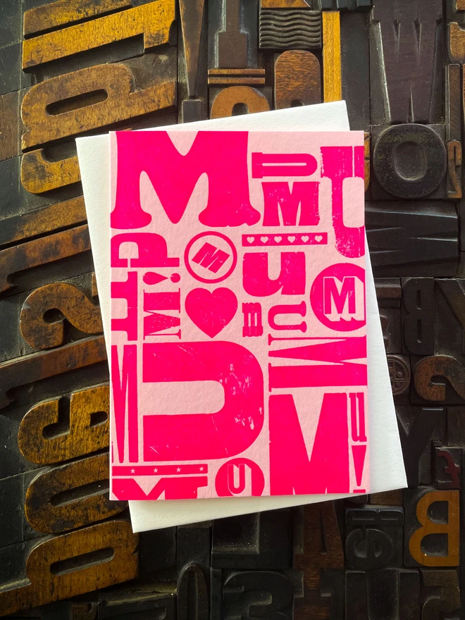 A deep impression letterpress printed mother's day card. Fluorescent pink ink on traditional printed type blocks. Printed bt hand on my 1915 Arab Crown Folio Press. Comes with a range of matching coloured envelopes.