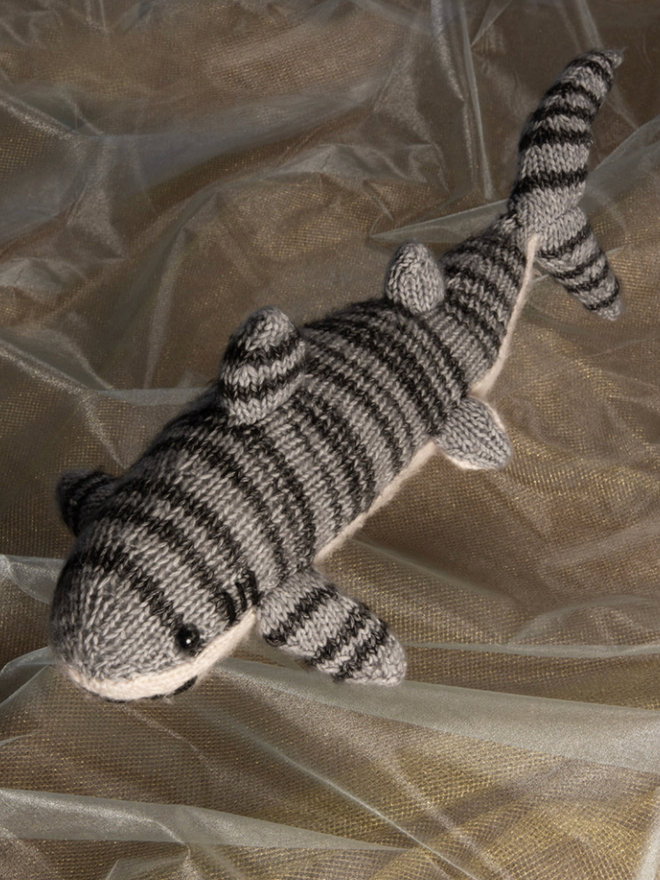 Tiger Shark Knitting Kit. A knitted tiger shark.