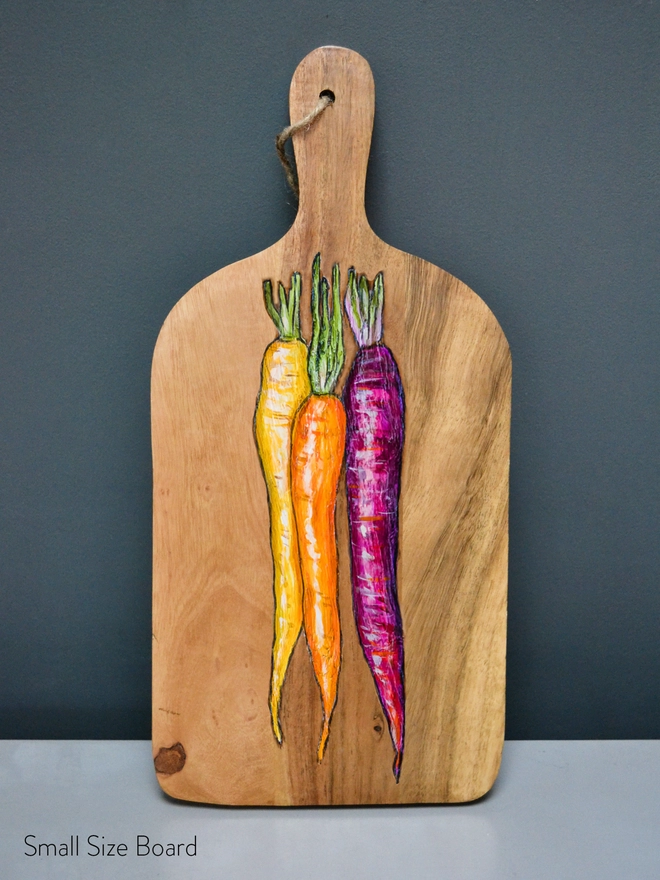 Small serving board with handpainted carrot design
