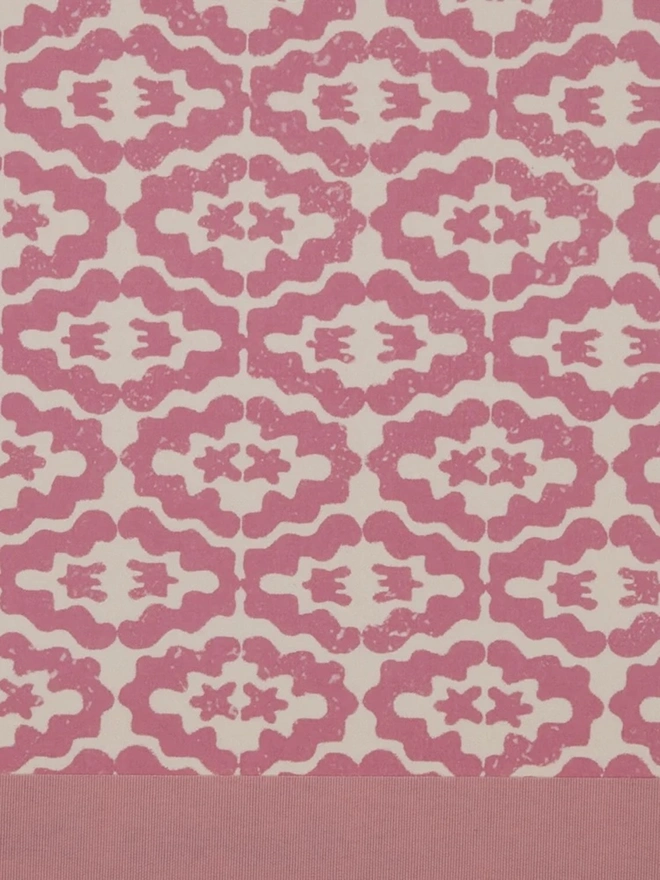 Retro Drum Lampshade. Close-up of a hand block printed lampshade showing a bold repeating geometric pattern. The colourful printed design and neat trim bring character and a handcrafted finish to any lamp.