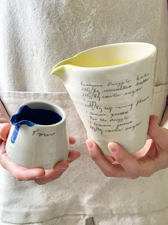 ceramic mini jug and handheld jug together