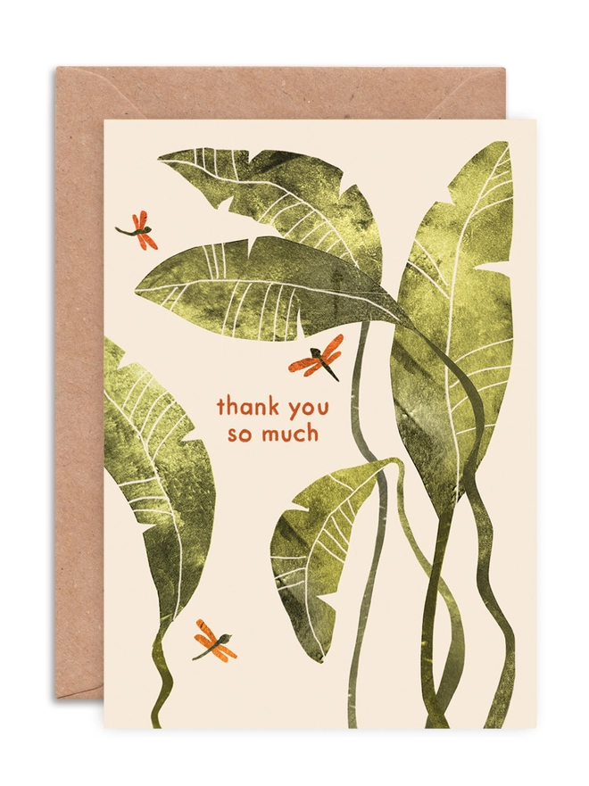 An illustrated greeting card by Emily Nash Illustration, featuring a palm leaf design. The collage illustration is textural and primarily green in colour. The card features the words 'thank you so much'.