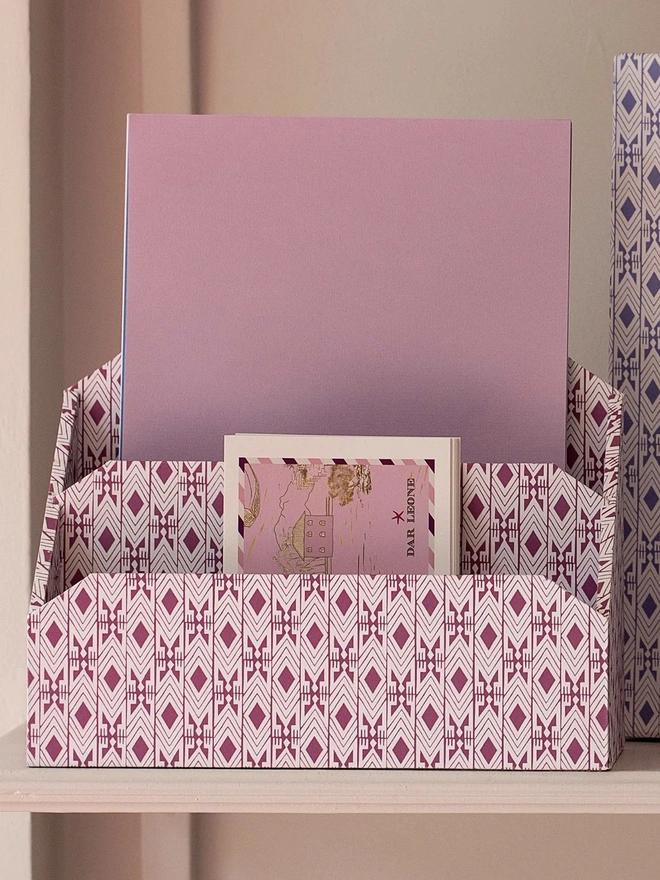 Tijan Letter Rack, a colourful patterned letter rack sitting in a study. 