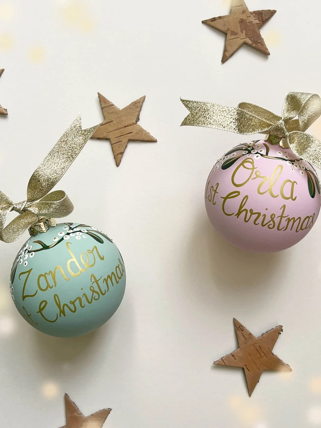 Duck egg blue and baby pink personalised baubles