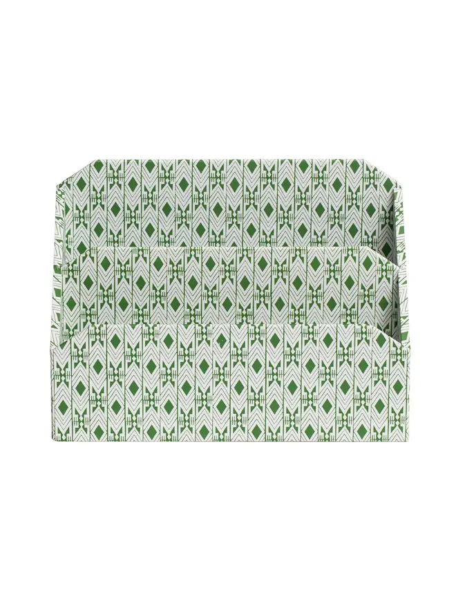 Tijan Letter Rack, a colourful patterned letter rack sitting on a white surface against a plain backdrop. 