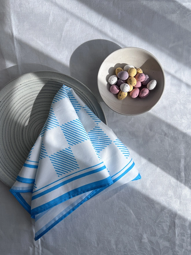 Checkerboard draughts napkin on an easter table