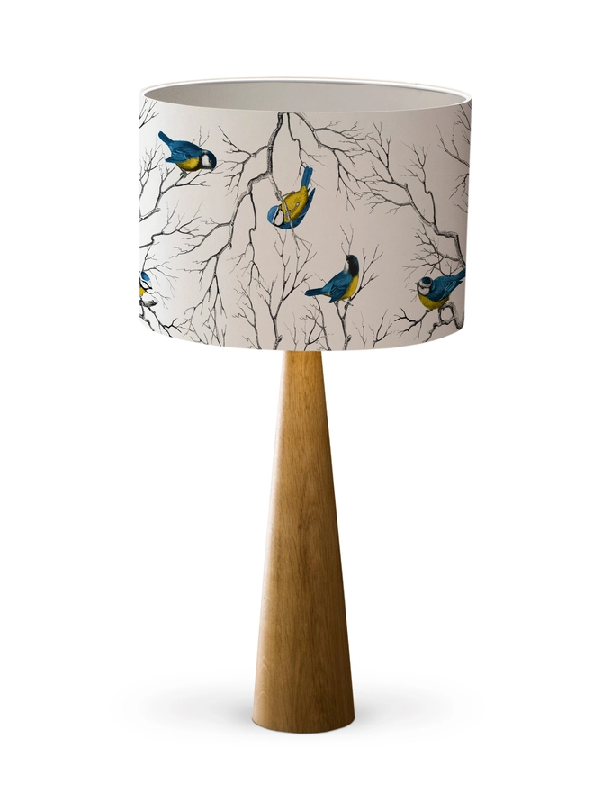 Blue Tit lampshade featuring a playful pattern of colourful British garden birds.