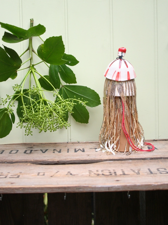 ceramic handmade Christmas tree topper decoration. gold sequin fringing tassels and bobble hat. Disco Thing 