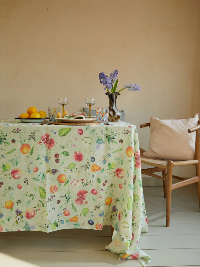 Table dressed with fruit printed table linen