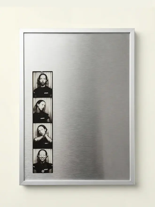 Magnetic Aluminium Picture Frame, hanging on a white wall. 