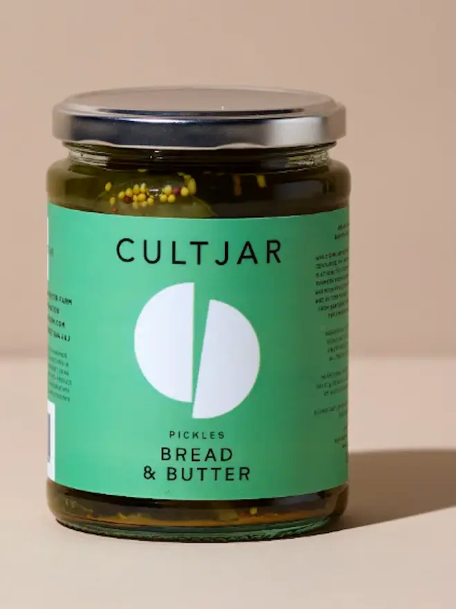 jar of bread and butter pickles with green label