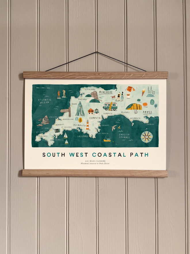 South West Coastal Path Print framed against a panelled background