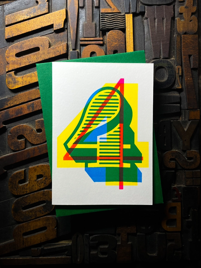 4th birthday anniversary milestone typographic letterpress card with deep impression print. Very colourful and vibrant. They show slight colour variations adding to the style anding to the charm of this handmade greeting card.