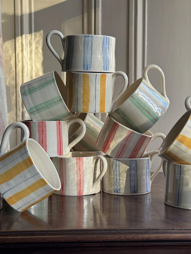 striped mugs stacked