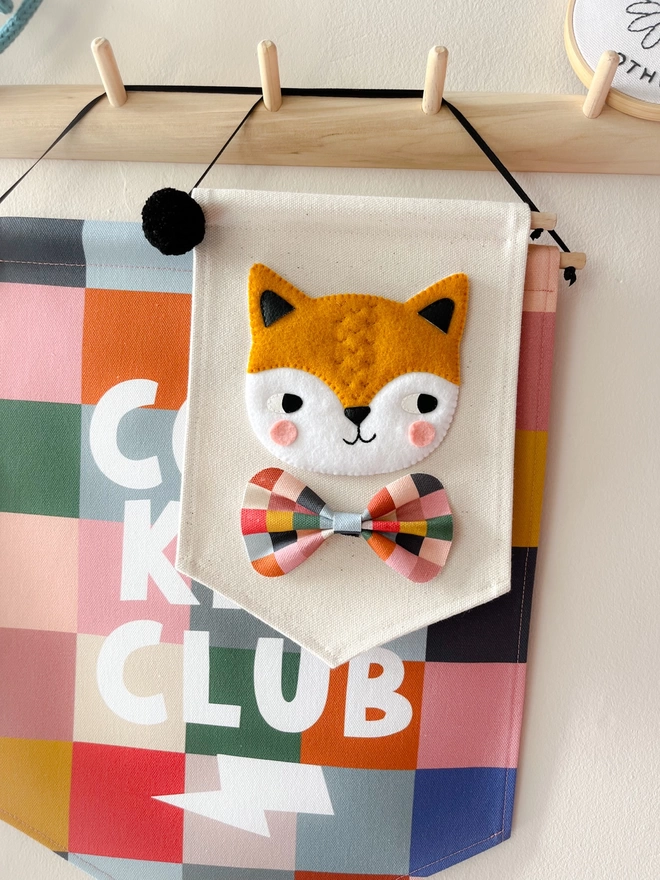 Cool kids club wall banner with a small fox banner with a matching bow tie