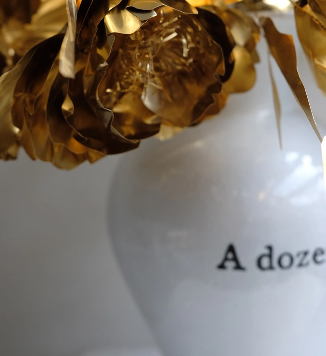 Close up of flowers of heirloom brass peony roses by artist Debbie Fairbrass