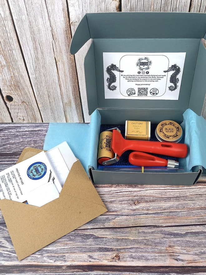 Essentials Lino Printing Craft Kit, full kit unpacked on table. 