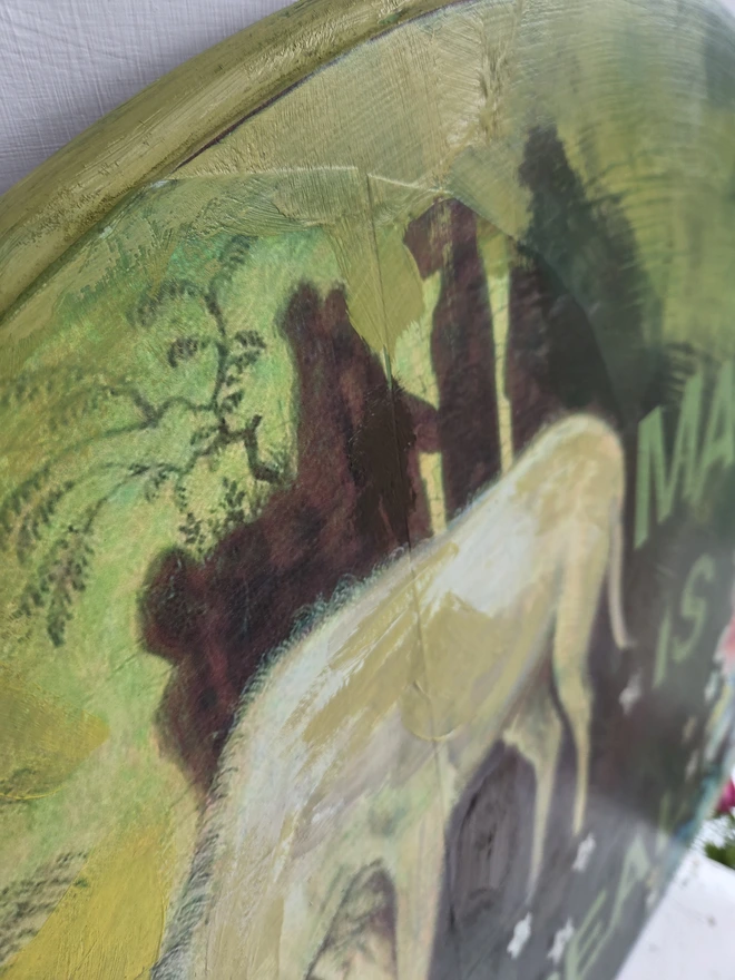 A magical unicorn art panel made from a reclaimed table-top