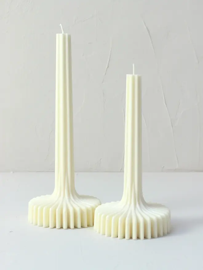 geometric aromatherapy soy candles (pack of 2). candles displayed on white surface.