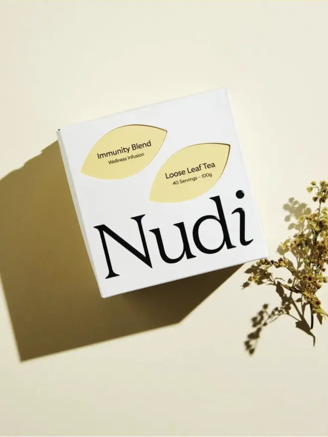 white box of immunity blend tea with yellow leaf design