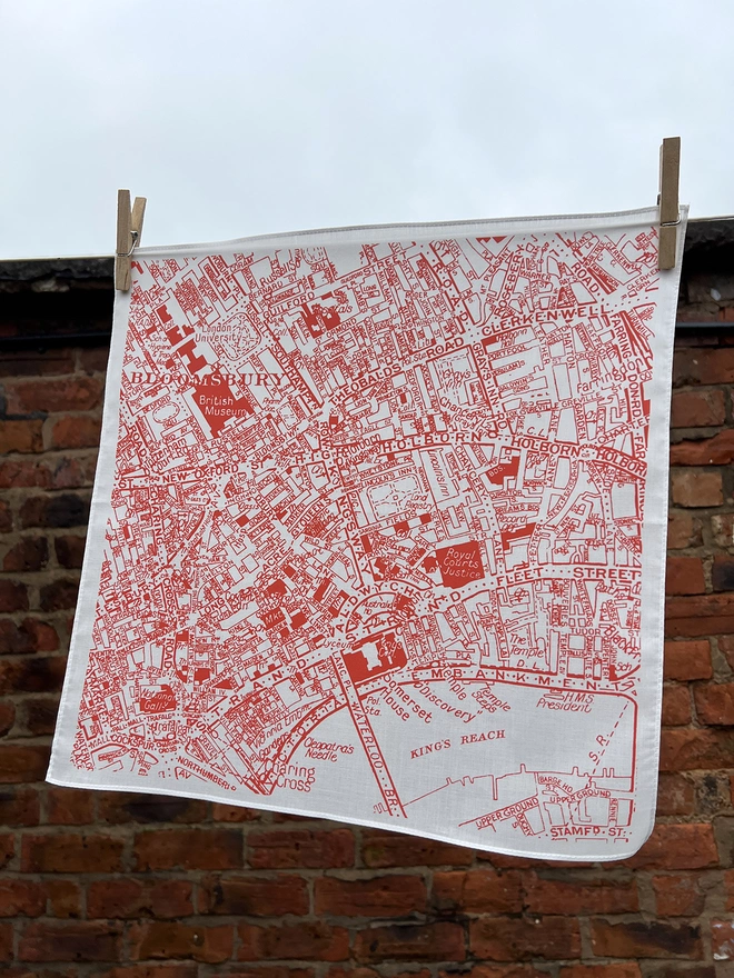 A Mr.PS London West Central Map Handkerchief hanging on a washing line