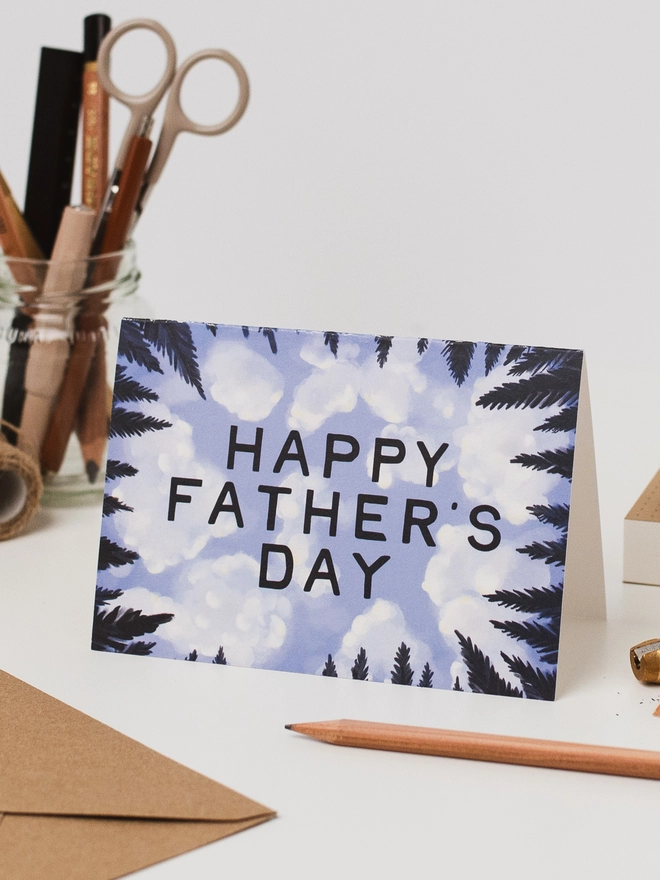 'Happy Father's Day' Sky Card propped up on a desk