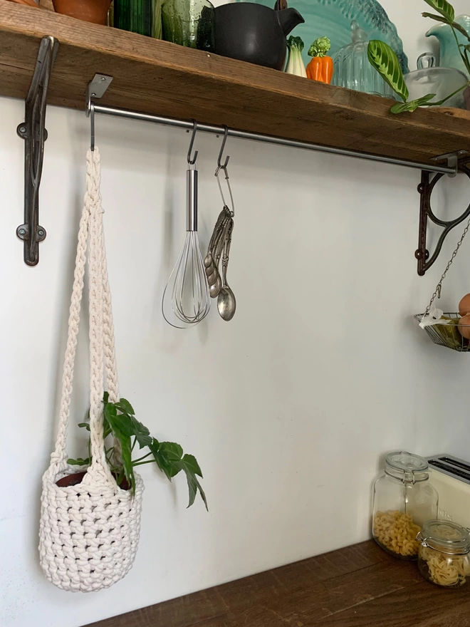 medium indoor cream hanging plant holder, recycled cotton cream three string hanging planter, handmade sustainable crochet decor, rustic natural organic homeware accessories, hanging ceiling plant holder with basket and hook to hang