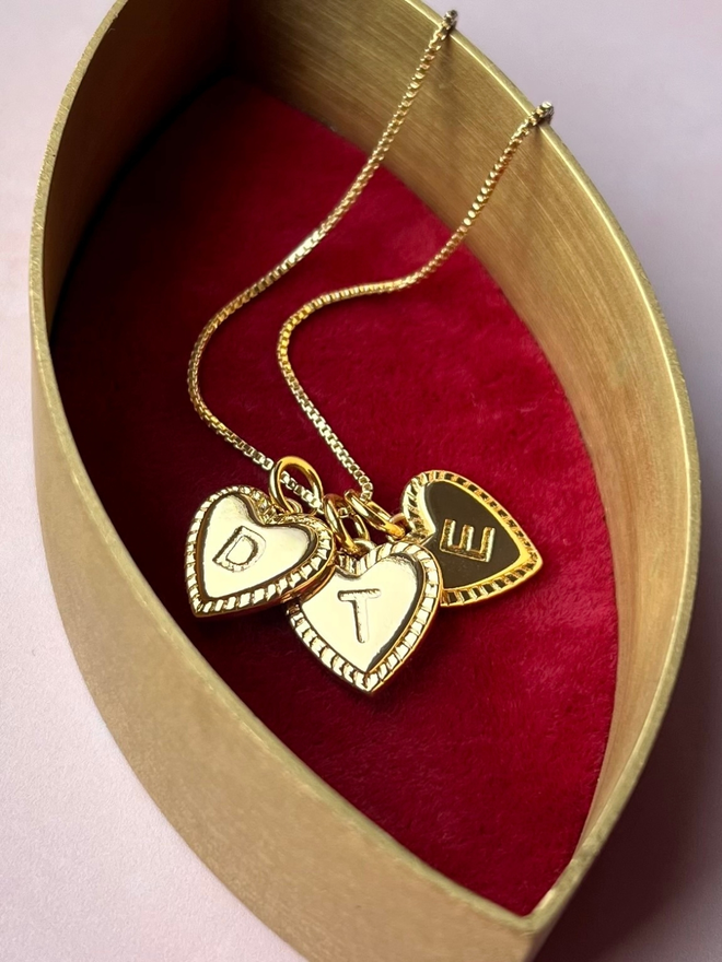 Personalised gold initial heart necklace on gold box chain