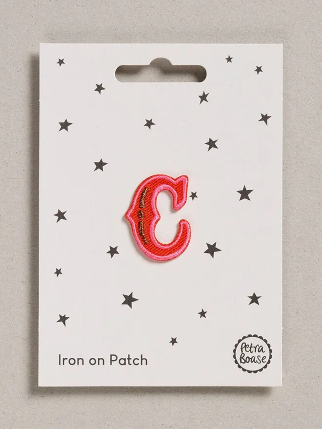 Alphabet letter C embroidered iron on fabric patch.