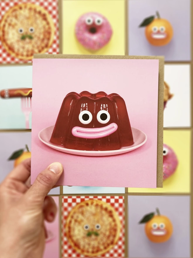 A jelly card being held. 