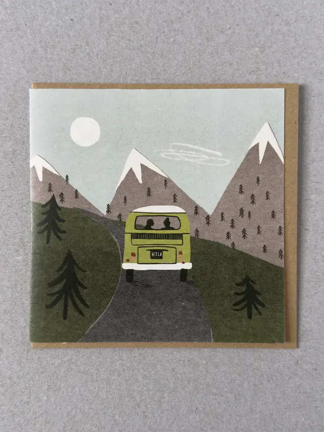 green campervan mountain road trip greetings card