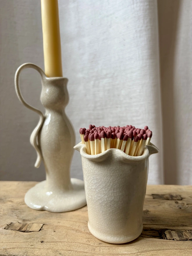 Cream crackle frilly matchstick pot with matches
