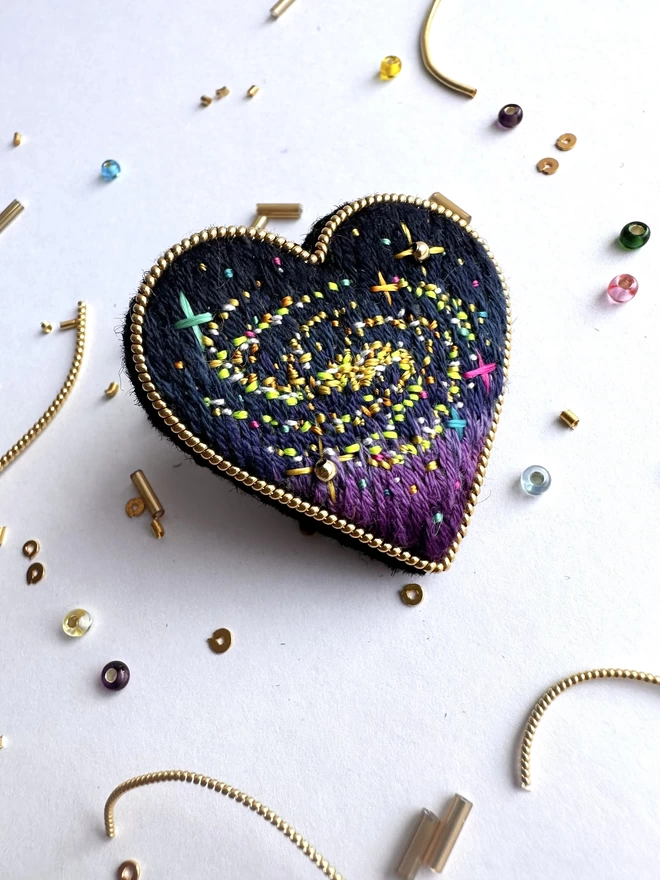 cosmic heart brooch.  