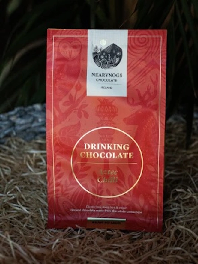 Drinking Chocolate 60% (Pack Of 200g/ 1kg), a packet of drinking chocolate sitting outside. 