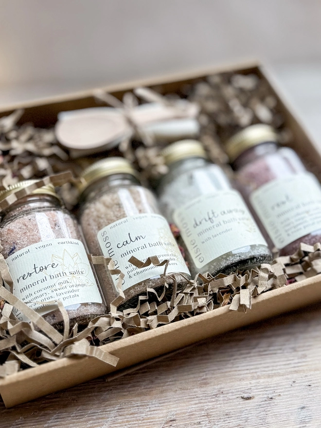 mini bath salts in glass jars gift set, presented in a lidded kraft box