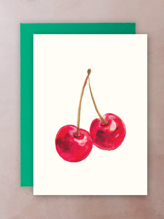 A card with a pair of cherries on