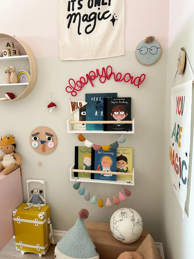 "Sleepyhead" styled on a kid's bedroom wall. 