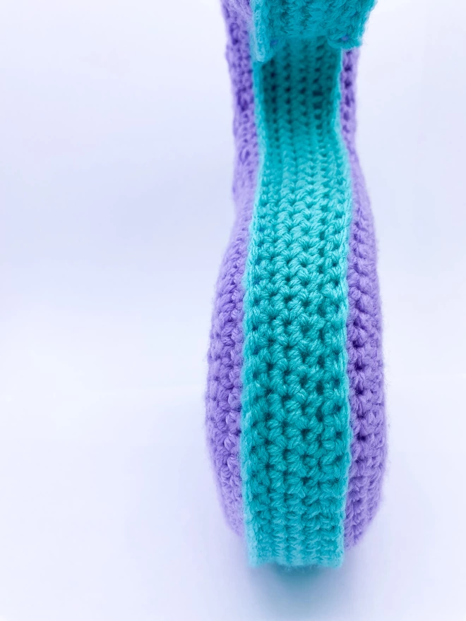 Crocheted S Cushion in Lilac and Teal, side view