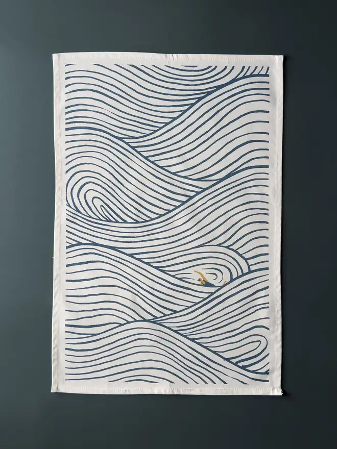 swimming wave pattern tea towel